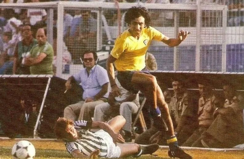 Salvadoran soccer player in action during a match, showcasing national pride.
